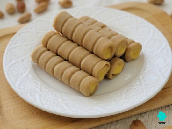 Receta de Huesos de santo: cómo preparar el dulce tradicional de mazapán relleno de crema de yema - Paso 12