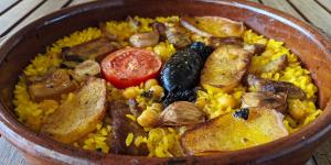 Los chefs valencianos coinciden: “El mejor arroz al horno no se hace con agua; lleva 2 partes de caldo de cocido por 1 de arroz”