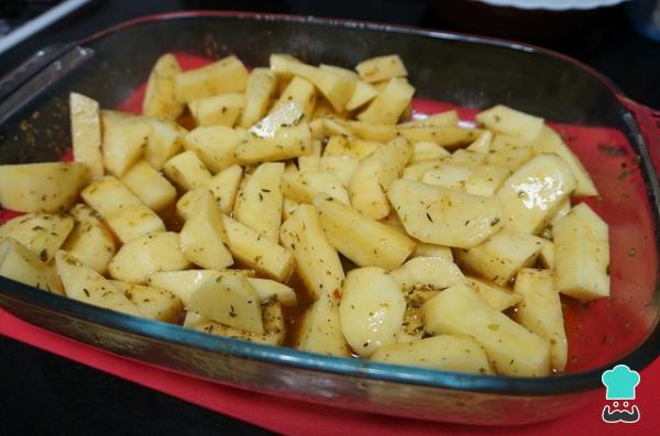 Receta de Patatas al horno jugosas - Paso 6