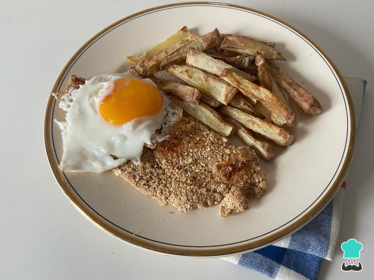 Receta de Milanesa con papas fritas a caballo