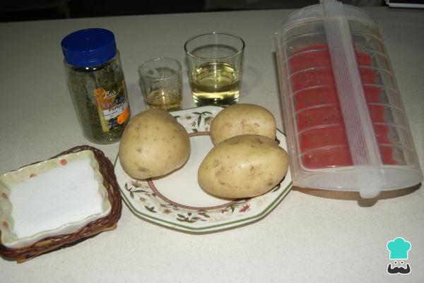 Receta de Patatas al vapor con hierbas lékué - Paso 1