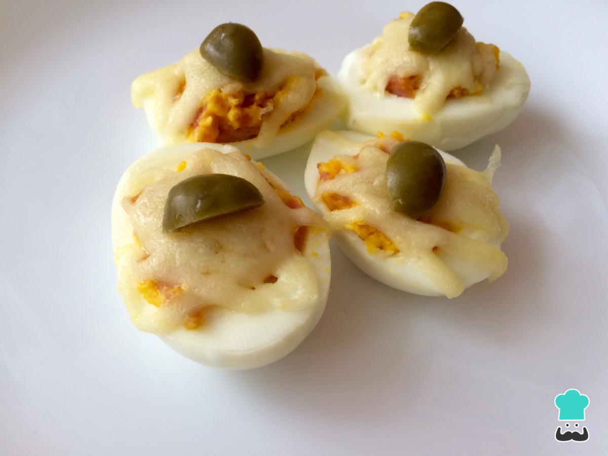 Receta de Huevos rellenos de jamón grartinados
