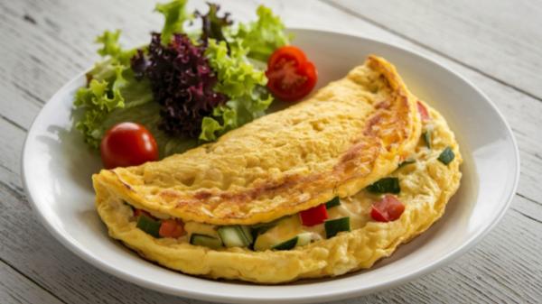 Más allá del café: 7 desayunos antiinflamatorios para deshincharte y llenarte de energía - Tortilla de verduras y jamón alta en proteínas